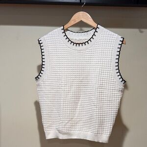 White Sleeveless Knit Top with Black Trim